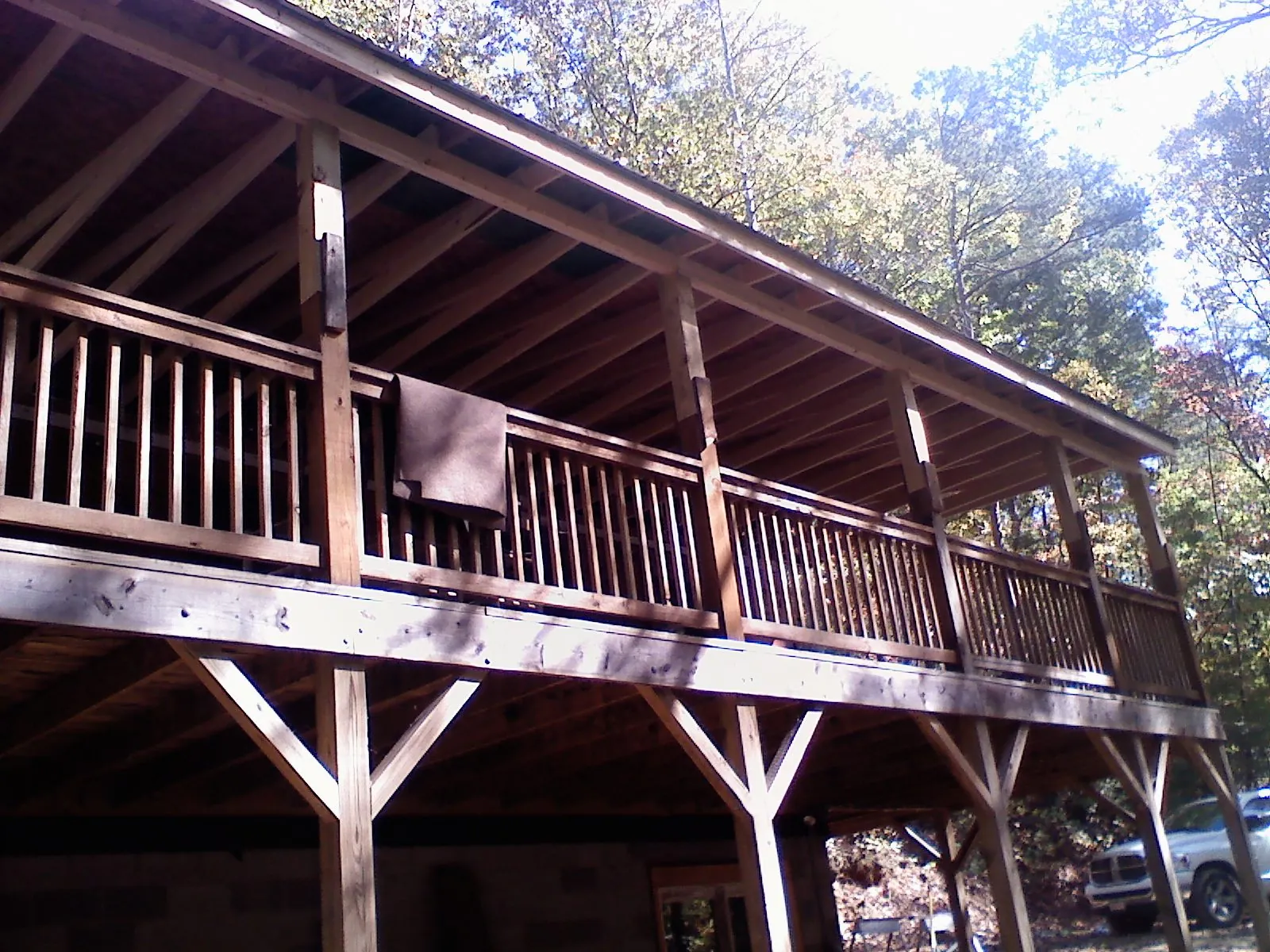 Timber framing under a new elevated porch and deck — Roof Leak Repair in Sunburg by Roofing Brothers